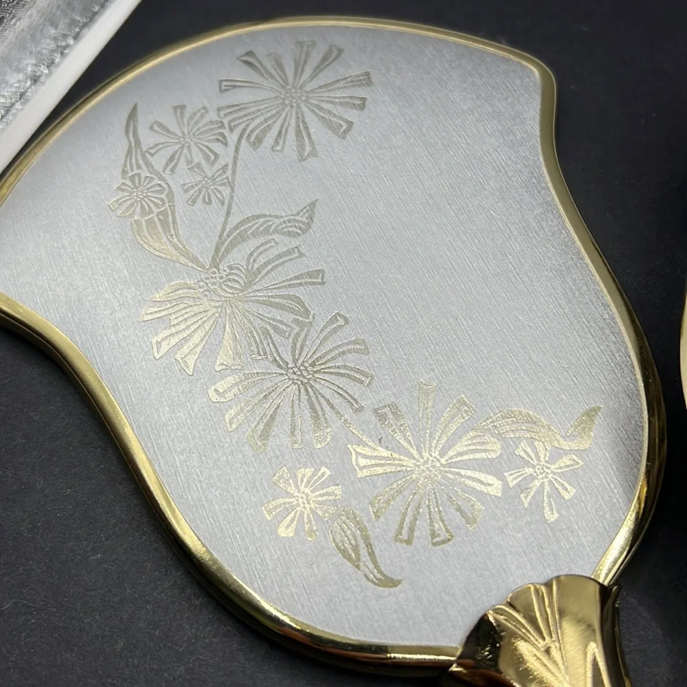 Vintage flower vanity hand mirror and brush